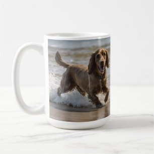 "Seaside Fun: A Cocker Spaniel Play in the Ocean Coffee Mug