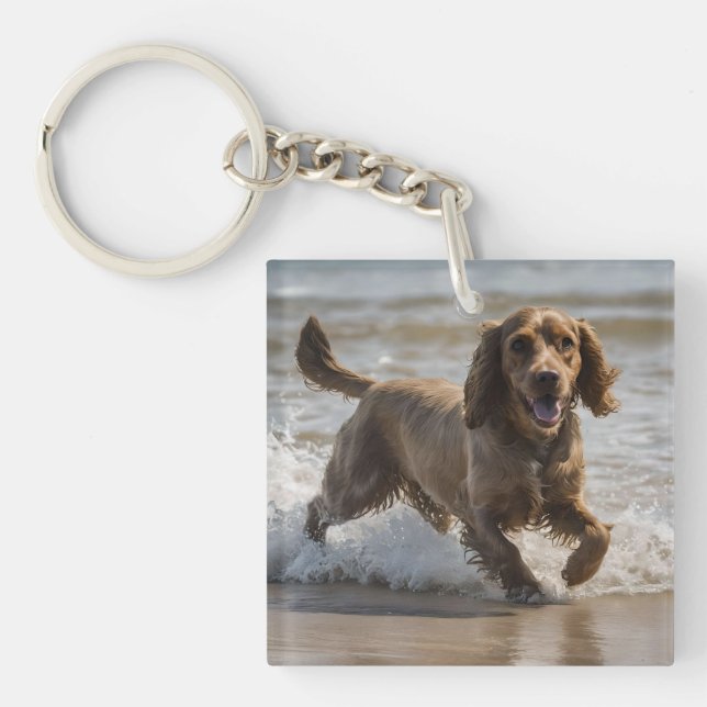 "Seaside Fun: Cocker Spaniel at Play in the Ocean Key Ring (Front)