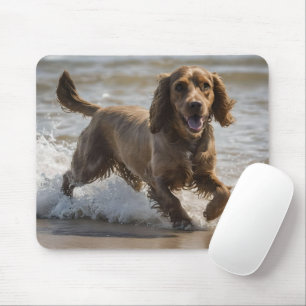 "Seaside Fun: Cocker Spaniel at Play in the Ocean Mouse Pad