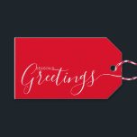 Season's Greetings Red White Minimalist Gift Tags<br><div class="desc">This minimalist and elegant gift tag features white Season's Greetings text on the front side and on the back side personalise it with your name or family name. The background is in red colour.</div>
