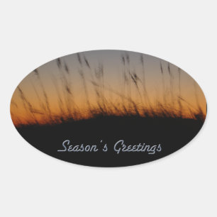 Season's Greetings Sea Oats and Dunes at Sunset Oval Sticker