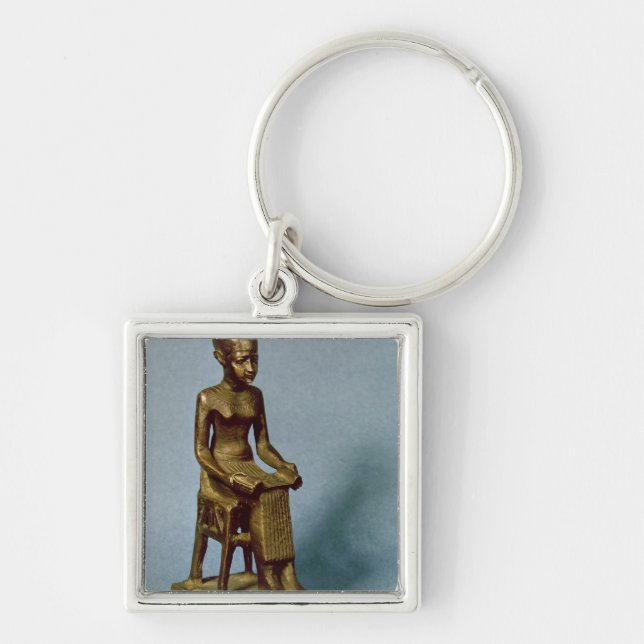 Seated statue of Imhotep  holding an open Key Ring (Front)