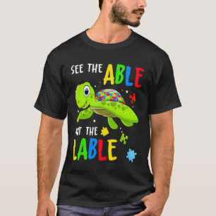 See the Able Not The Label Cute Turtle Autism Awar T-Shirt