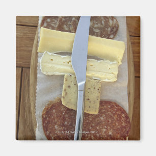 Selection of gourmet cheeses and cut meats magnet