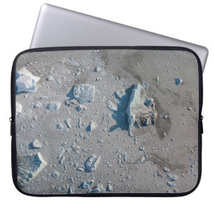 Selective focus of grey stone laptop sleeve