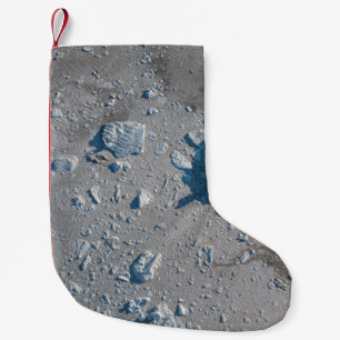 Selective focus of grey stone small christmas stocking