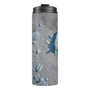 Selective focus of grey stone thermal tumbler