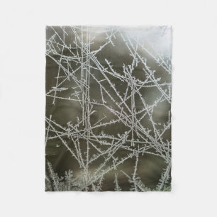 Selective focus of snowflakes fleece blanket