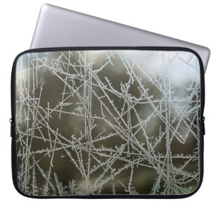 Selective focus of snowflakes laptop sleeve
