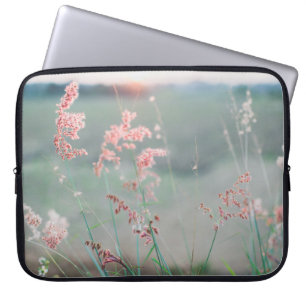 SELECTIVE FOCUS PHOTO OF PINK PETALED FLOWERS LAPTOP SLEEVE