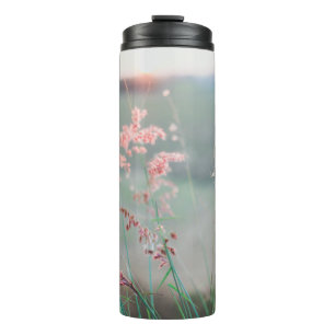 SELECTIVE FOCUS PHOTO OF PINK PETALED FLOWERS THERMAL TUMBLER
