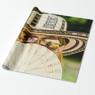 Selective focus photo of woman wearing aviator sun wrapping paper