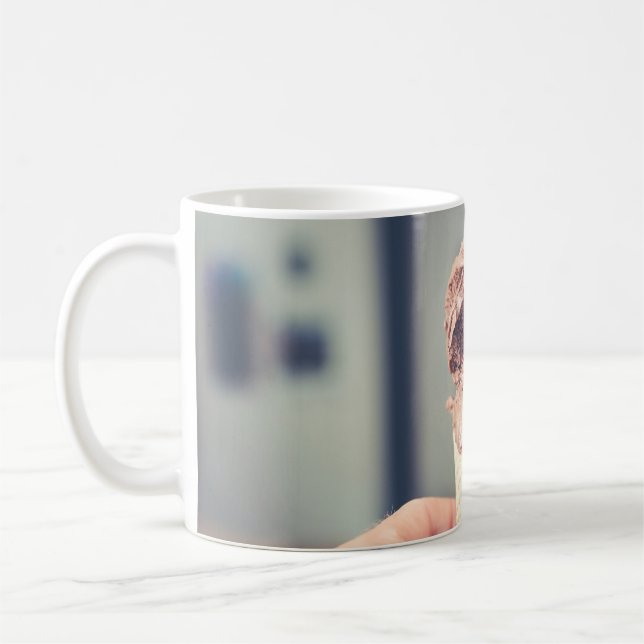 Selective focus photography of chocolate ice cream coffee mug (Left)