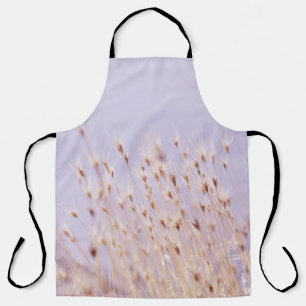 SELECTIVE FOCUS PHOTOGRAPHY OF GRASS FIELD APRON