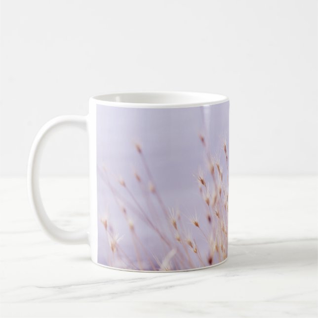 SELECTIVE FOCUS PHOTOGRAPHY OF GRASS FIELD COFFEE MUG (Left)