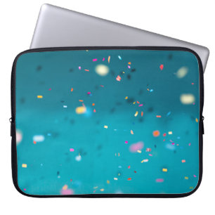 Selective focus photography of multicolored confet laptop sleeve