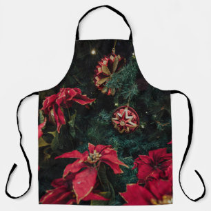 SELECTIVE FOCUS PHOTOGRAPHY OF RED POINSETTIA PLAN APRON