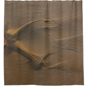 Selective focus photography of sand shower curtain