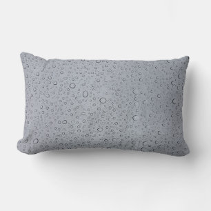 Selective focus photography of water droplets lumbar cushion