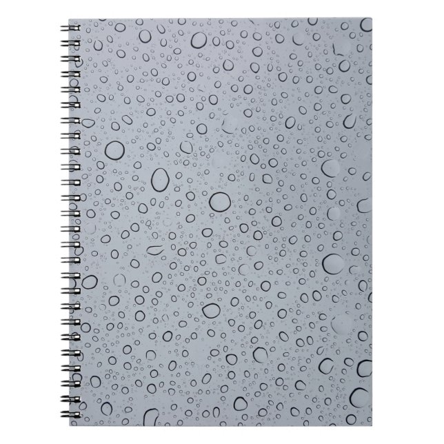 Selective focus photography of water droplets notebook (Front)
