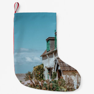 SELECTIVE FOCUS PHOTOGRAPHY OF WHITE AND BROWN CON SMALL CHRISTMAS STOCKING