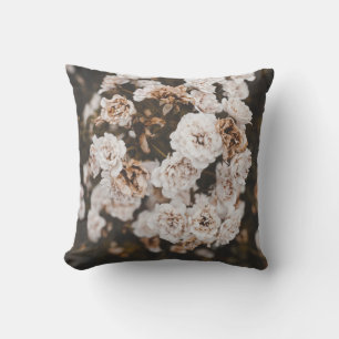 SELECTIVE FOCUS PHOTOGRAPHY OF WHITE PETALED FLOWE CUSHION