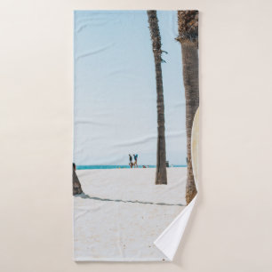 Selective focus photography of white surfboard bath towel