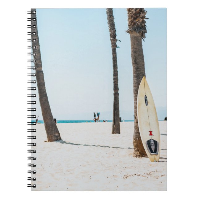 Selective focus photography of white surfboard notebook (Front)