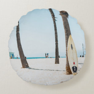 Selective focus photography of white surfboard round cushion