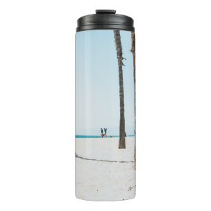 Selective focus photography of white surfboard thermal tumbler
