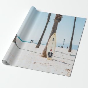 Selective focus photography of white surfboard wrapping paper