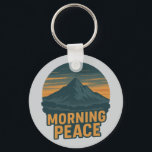 Serene Mountain Sunrise Retro Emblem Key Ring<br><div class="desc">♾️This serene emblem captures the stillness of morning light behind a mountain. Designed in a retro aesthetic,  it's ideal for nature enthusiasts,  campers,  and anyone drawn to peaceful landscapes.💟</div>