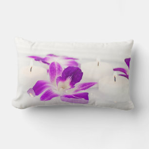 Serene orchid and candles in water lumbar cushion