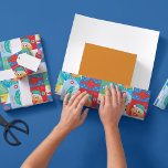 Sesame Street Christmas Pattern | Add Your Name Wrapping Paper<br><div class="desc">This festive wrapping paper features a colorful Christmas-themed pattern with beloved Sesame Street characters, including Elmo, Cookie Monster, and Big Bird, surrounded by holiday decorations. With the option to add your name, this customizable design adds a personal and cheerful touch to your gift wrapping. Perfect for Sesame Street fans, it...</div>