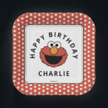 Sesame Street | Elmo - First Birthday Paper Plates<br><div class="desc">Serve up the cake on the most fun and energetic dish possible with the Elmo Birthday Celebration Plate! This square plate features Elmo’s beaming face surrounded by "Happy Birthday, " all framed by a lively red and white polka dot border. It's the perfect, childlike essential for the main event. This...</div>