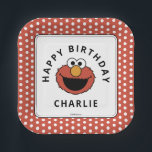 Sesame Street | Elmo - First Birthday Paper Plates<br><div class="desc">Serve up the cake on the most fun and energetic dish possible with the Elmo Birthday Celebration Plate! This square plate features Elmo’s beaming face surrounded by "Happy Birthday, " all framed by a lively red and white polka dot border. It's the perfect, childlike essential for the main event. This...</div>