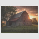Setting Sun Peaking Around a Large Wooden Barn