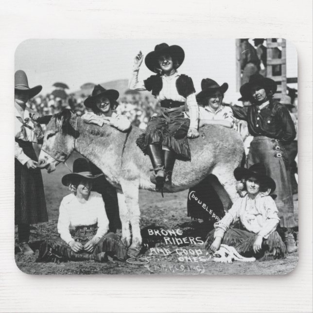 Seven rodeo cowgirls jokingly posing with a donkey mouse pad (Front)