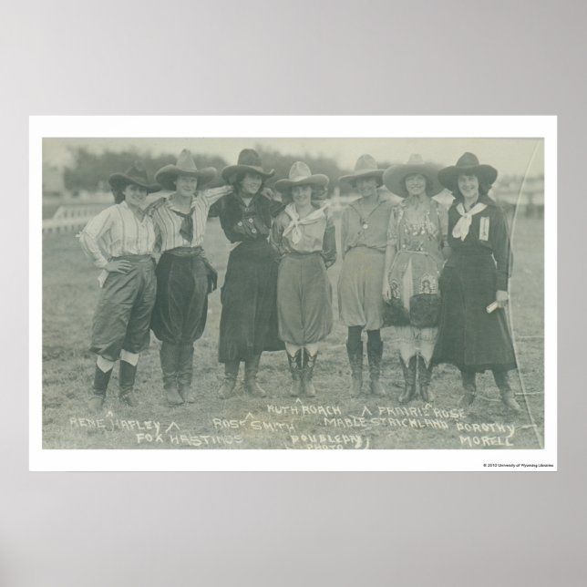 Seven rodeo cowgirls posing for a photograph. poster (Front)
