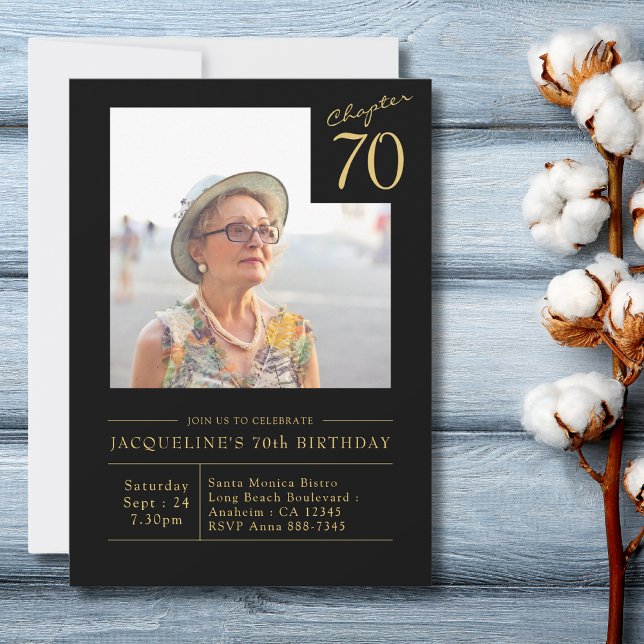 Seventy Black Gold 70th Birthday Party Invitation (70th Birthday Black and gold birthday party invitation with photo on a light blue wood table top)