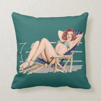 Sexy redhead pinup girl in green bikini cushion