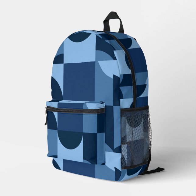 Shades of blue geometric shapes pattern printed backpack (Back Corner Right)