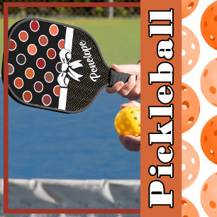Shades of Red Polka Dots on Black, Faux White Bow Pickleball Paddle