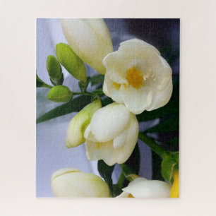 Shades of yellow on white freesia jigsaw puzzle