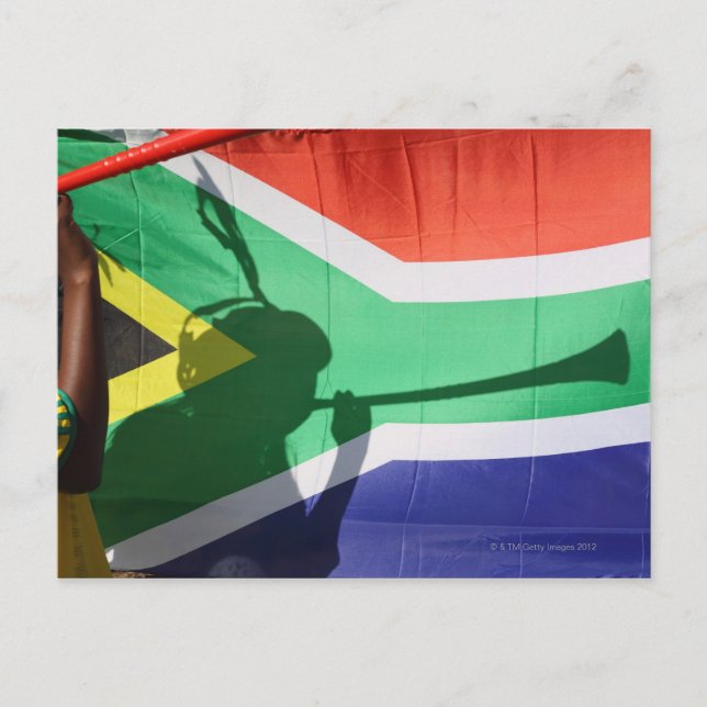 Shadow of soccer supporter blowing vuvuzela, postcard (Front)