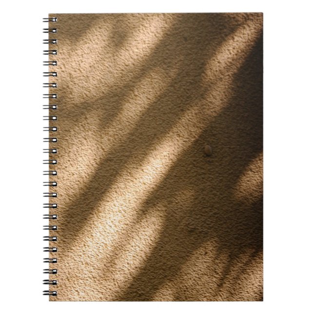 Shadow on brown carpeted floor notebook (Front)