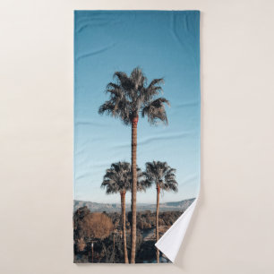 Shallow focus photo of palm trees in the morning bath towel