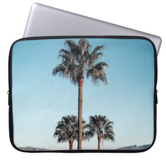 Shallow focus photo of palm trees in the morning laptop sleeve
