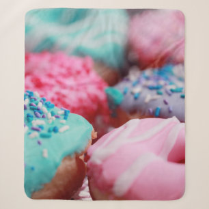SHALLOW FOCUS PHOTOGRAPHY OF ASSORTED DOUGHNUTS WI SHERPA BLANKET