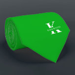 Shamrock Green Elegant Monogram   Name One-Sided Tie<br><div class="desc">An elegant necktie featuring a bold white monogram across a Shamrock Green background. On top of this monogram sits your first or last name spelled out in all capitals. If you prefer a bolder look for the personal name inside of the large letter you can do the following: Use the...</div>